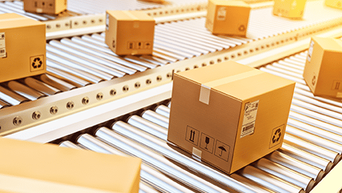 boxes moving down a conveyor belt