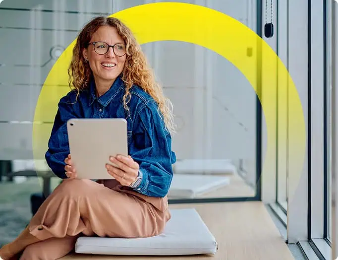 person sitting with a tablet